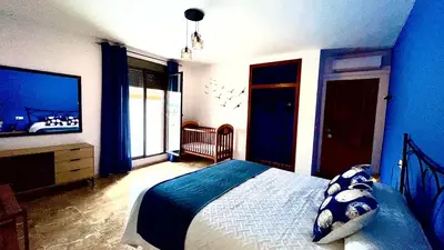Cama o camas de una habitación en Villa Jardín