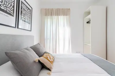 Cama o camas de una habitación en Confortable apto. 3 habitaciones