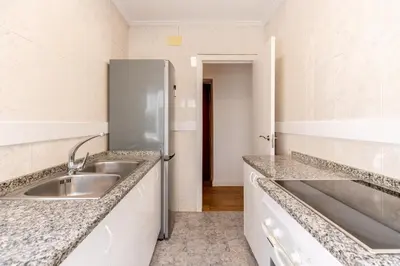 Una cocina o zona de cocina en Confortable apto. 3 habitaciones