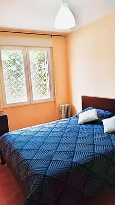 Cama o camas de una habitación en Acogedor piso en Puertollano