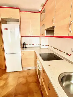Una cocina o zona de cocina en Acogedor piso en Puertollano
