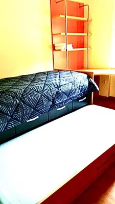 Cama o camas de una habitación en Acogedor piso en Puertollano