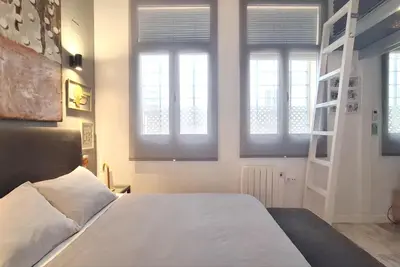Cama o camas de una habitación en Modern Loft in the heart of Seville