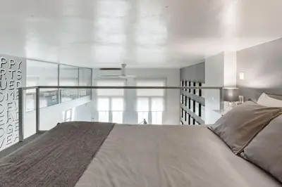 Cama o camas de una habitación en Modern Loft in the heart of Seville