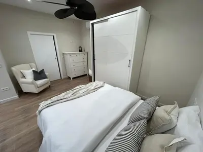 Cama o camas de una habitación en Pintor Espinosa 3 loft
