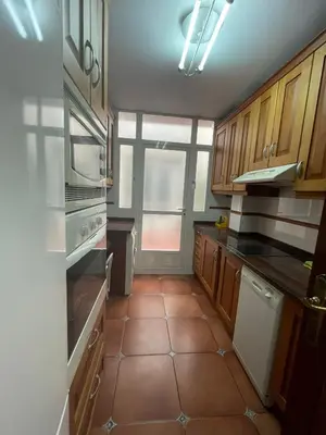 Una cocina o zona de cocina en Alojamiento Comercio.