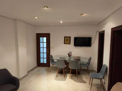 Una televisión o centro de entretenimiento en Alojamiento Comercio.