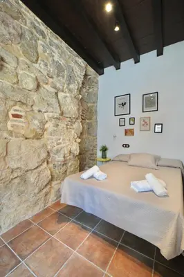 Cama o camas de una habitación en Romero Suites 3