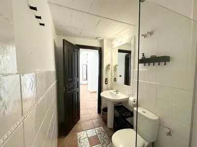 Un baño de Romero Suites 3