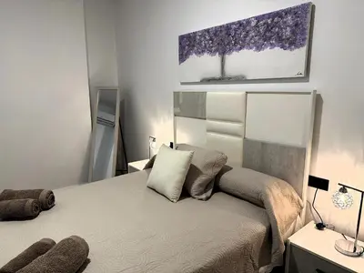 Cama o camas de una habitación en DS Ziryab Suites 2