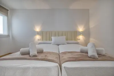 Cama o camas de una habitación en Apartamento Vizconde de Miranda & Parking incluido & Casco histórico