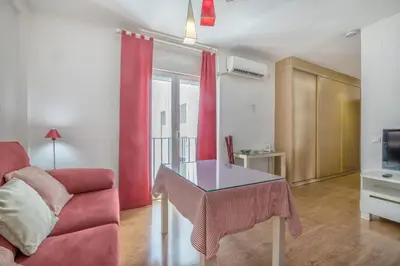 Una televisión o centro de entretenimiento en San Miguel Cordoba Center Apartment