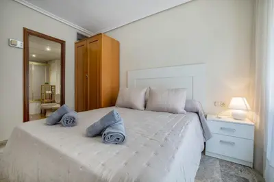 Cama o camas de una habitación en R & T Córdoba Center Apartamentos - Parking