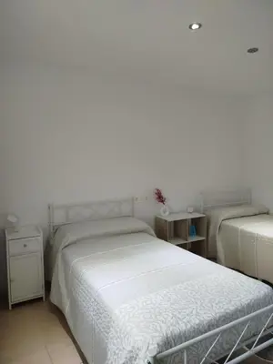 Cama o camas de una habitación en La Perules
