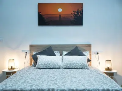 Cama o camas de una habitación en STUDIO 9 APARTAMENTO SEVILLA