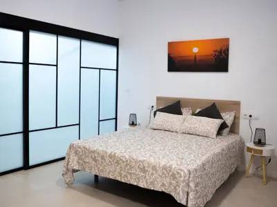 Cama o camas de una habitación en STUDIO 9 APARTAMENTO SEVILLA
