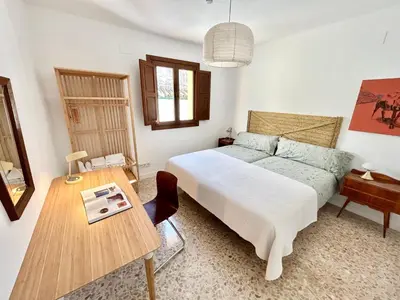 Cama o camas de una habitación en Apartamento junto a la mezquita y el Guadalquivir