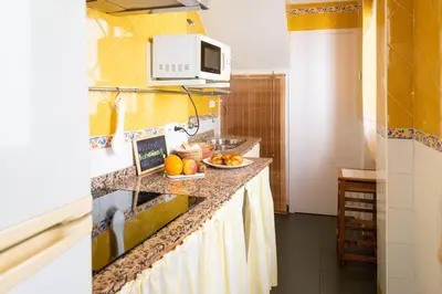 Una cocina o zona de cocina en Espíritu Santo Primero