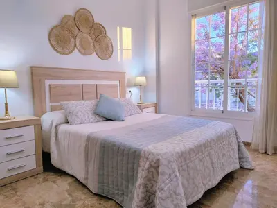 Cama o camas de una habitación en Alojamiento La Palmera