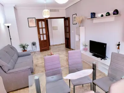 Una televisión o centro de entretenimiento en Alojamiento La Palmera