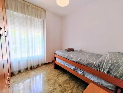 Cama o camas de una habitación en Alojamiento La Palmera