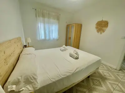 Cama o camas de una habitación en Geysotur Barrios