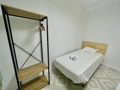Cama o camas de una habitación en Geysotur Barrios