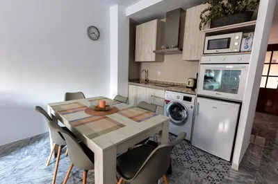 Una cocina o zona de cocina en Parking Entre Patios Centro