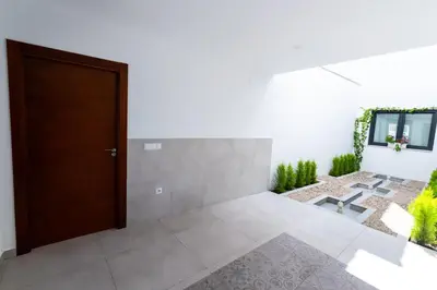 Una televisión o centro de entretenimiento en Villa 25