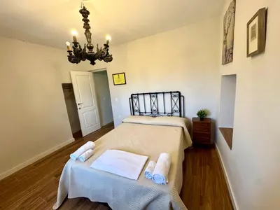 Cama o camas de una habitación en Casa rural DOS ENCINAS