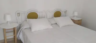 Cama o camas de una habitación en Divertida y Romántica