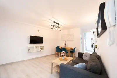 Una televisión o centro de entretenimiento en Apartamento LEVI Centro Córdoba
