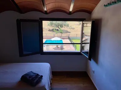 Cama o camas de una habitación en Casa Rural La Charquera