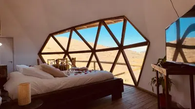 Cama o camas de una habitación en Domo Family