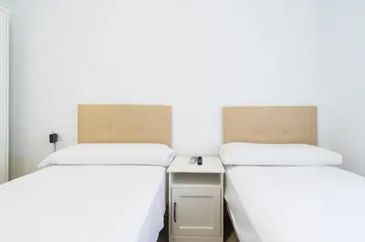 Cama o camas de una habitación en Panther Home Alameda