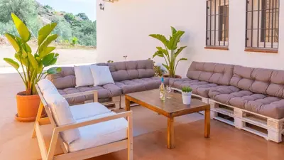 Zona de estar de Villa Los Ruedos Riogordo by Ruralidays