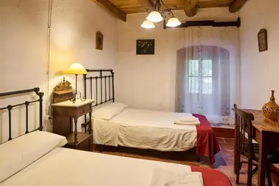 Cama o camas de una habitación en Casa Rural con encanto El Coronel, Los Pánchez, Fuente Obejuna