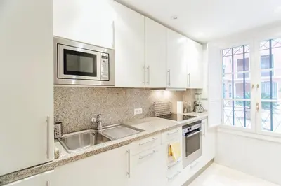 Una cocina o zona de cocina en Stylish duplex - Pool - Seville Historical Center