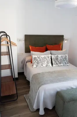 Cama o camas de una habitación en La Carrera 7 - Baños Árabes - Parking sujeto a disponibilidad