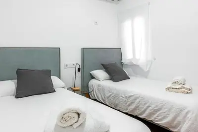 Cama o camas de una habitación en Resolana Home Sevilla !