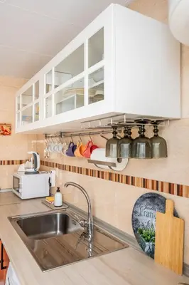 Una cocina o zona de cocina en Piso con patio privado y parking Nervión Sevilla