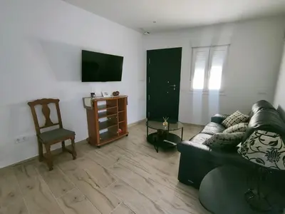 Una televisión o centro de entretenimiento en Casa Cantinero 2 - Parking Gratis
