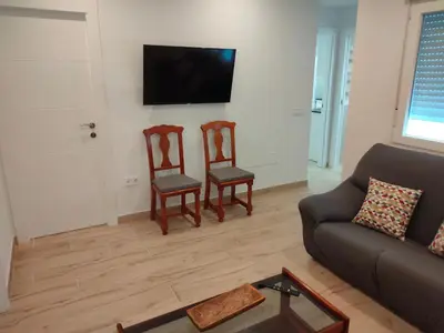 Una televisión o centro de entretenimiento en Casa Cantinero 1 - Parking Gratis