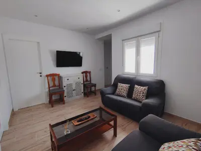 Una televisión o centro de entretenimiento en Casa Cantinero 1 - Parking Gratis