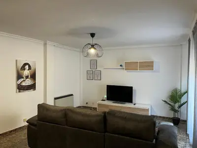 Una televisión o centro de entretenimiento en Apartamento Mágina
