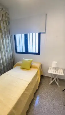 Cama o camas de una habitación en Villa Familia