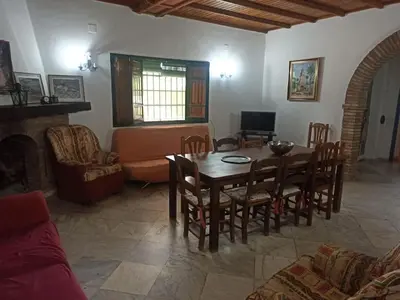 Una televisión o centro de entretenimiento en Finca Rústica La Palmera