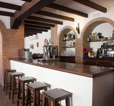 El salón o zona de bar de Hospedería Convento de Santa Clara