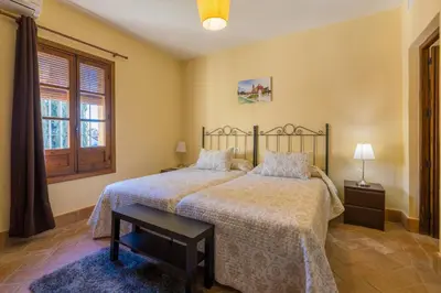 Cama o camas de una habitación en Hospedería Convento de Santa Clara