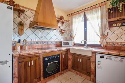 Una cocina o zona de cocina en Casa Rural El Rincón